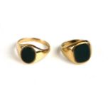 TWO EARLY 20TH CENTURY 9CT GOLD AND BLOODSTONE GENT'S SIGNET RINGS Each set with an oval