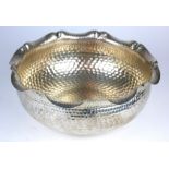 A LARGE EARLY 20TH CENTURY GERMAN SILVER BOWL Having a planished finish and impressed crescent .