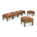 RENZO MONGIARDINO, A SET OF SIX REGENCY DESIGN PARCEL GILT AND EBONISED STOOLS With floral cut
