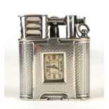 DUNHILL, AN ART DECO SILVER 'UNIQUE' WATCH LIGHTER Having engine turned decoration and hinged