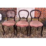 A SET OF THREE VICTORIAN MAHOGANY BALLOON BACK CHAIRS With cut velvet overstuffed upholstered