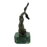 A BRONZE STATUE OF A HARE On green marble base. (21cm) Condition: good throughout