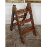 A SET OF FOLDING PINE THREE TREAD SIGN 'WINE MERCHENT'S' STEPS. (h 81cm)