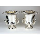 A PAIR OF SILVER PLATED TWIN HANDLED CAMPAGNA FORM CHAMPAGNE BUCKETS. (26cm) Condition: good