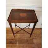 AN EDWARDIAN MAHOGANY AND SATINWOOD MARQUETRY INLAID SILVER TABLE With shaped galleried top,