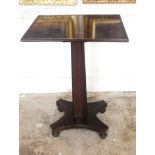 A REGENCY PERIOD ROSEWOOD AND BRASS INLAID OCCASIONAL TABLE The rectangular top raised on an