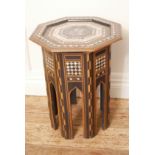 A MOORISH HEXAGONAL OCCASIONAL TABLE With mother of pearl and marquetry. (38.5cm x 38.5cm x 50cm)