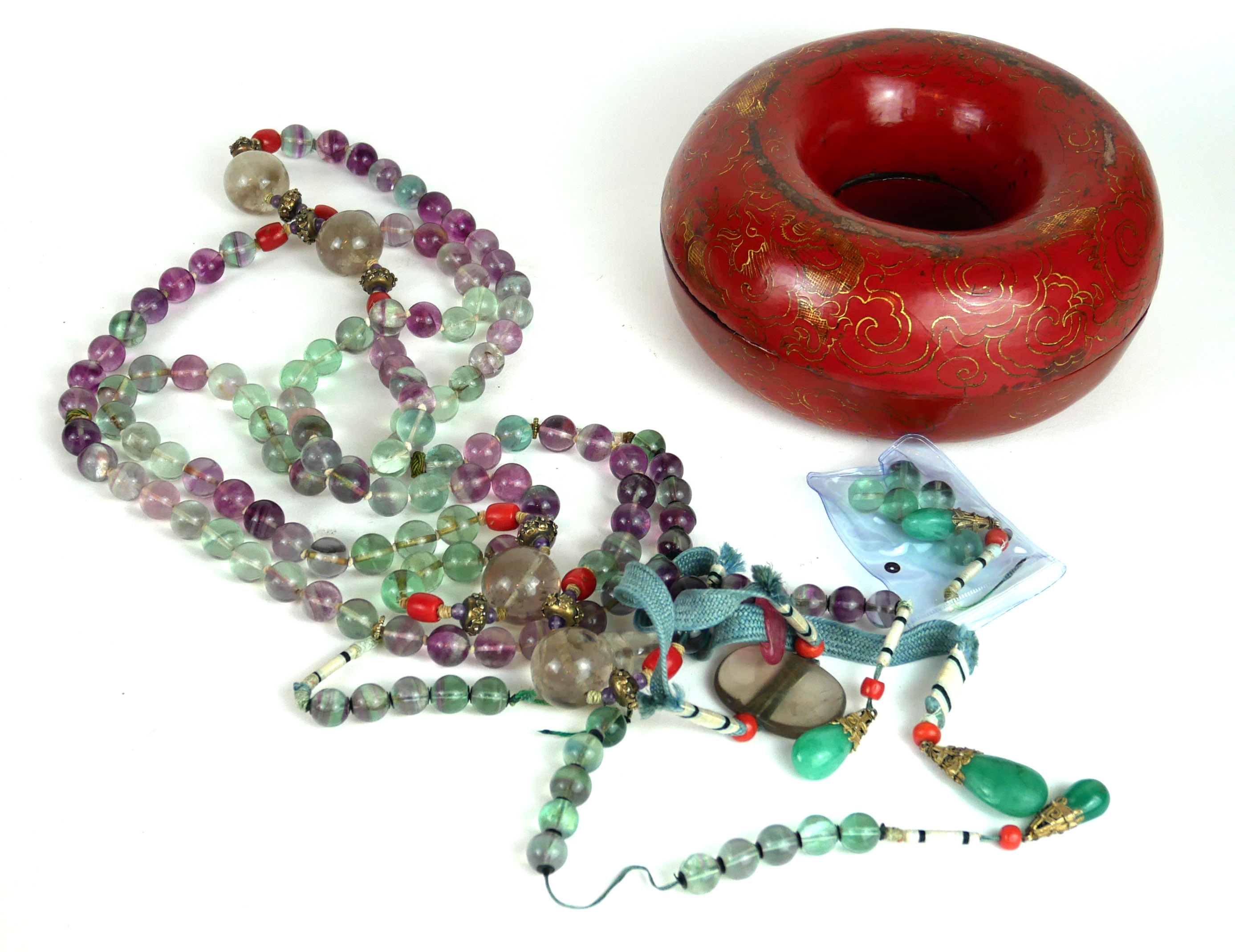 A CHINESE GLASS CHAO ZHU DESIGN COURT NECKLACE The strand of spherical coloured glass beads