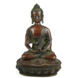 A CHINESE BRONZE STATUE OF A SEATED BUDDHA . (h 29cm)