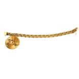 A 14CT GOLD BRACELET HUNG WITH A 14CT GOLD, RUBY AND PEARL ENCRUSTED ROYAL COACH ROUNDEL. (20cm,