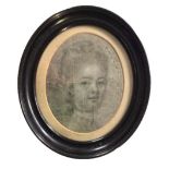 A 17TH/18TH CENTURY OVAL PORTRIT, DRAWING OF A YOUNG GIRL. Ebony framed.