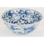 A CHINESE BLUE AND WHITE PORCELAIN 'FIVE TOE DRAGON' BOWL Hand painted with dragons amongst stylized