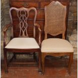 A GEORGIAN STYLE MAHOGANY OPEN ARMCHAIR With pierced latticework back and cream upholstered drop
