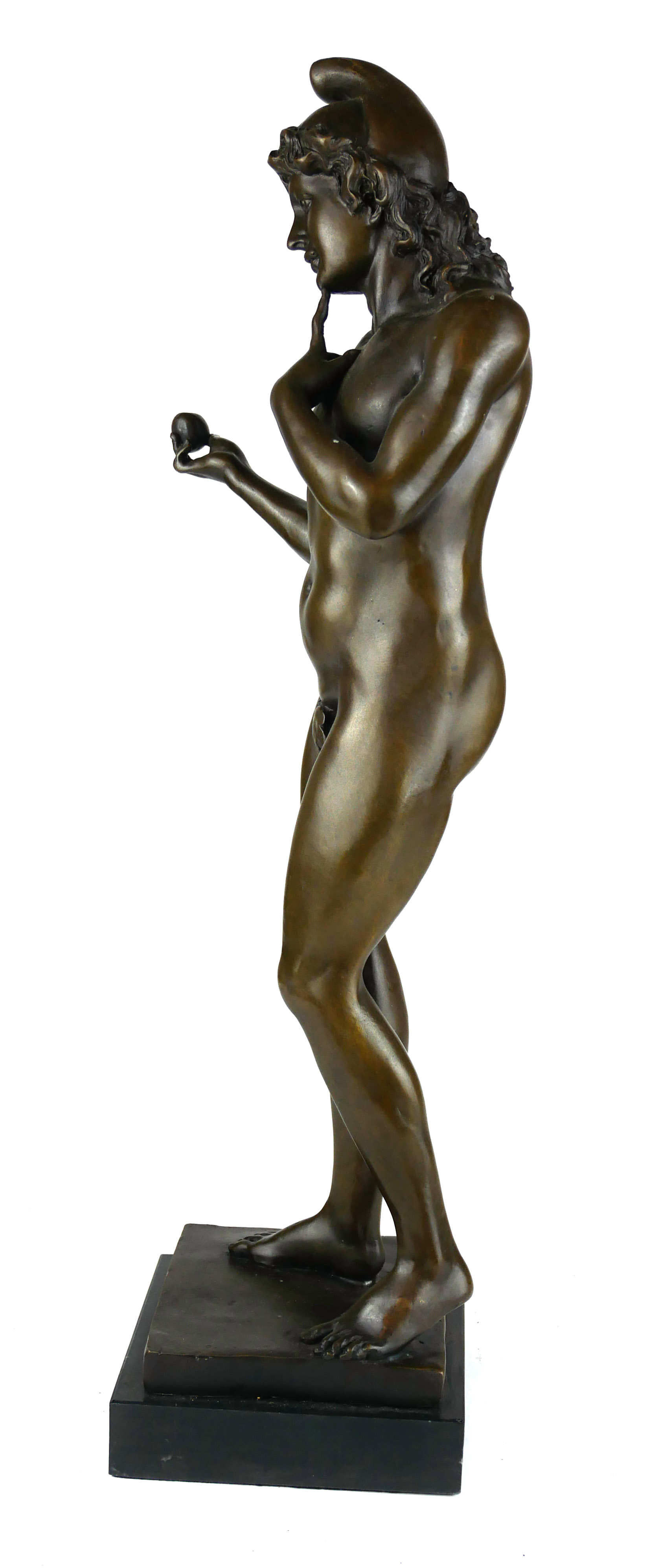 A BRONZE STATUE ROMANESQUE NAKED BOY HOLDING AN APPLE On black marble base. (51cm) Condition: good - Image 2 of 2