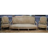 AN 18TH CENTURY FRENCH LOUIS XV GILTWOOD THREE PIECE SUITE Comprising a large settee and pair of