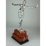 AN ART DECO STYLE SILVERED BRONZE STATUE Dancing girl in Egyptian dress, on rouge marble base. (