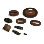 A COLLECTION OF 19TH CENTURY JAPANESE BRONZE SAMURAI SWORD PARTS Comprising a tsuba and blade