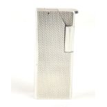 DUNHILL, A VINTAGE SILVER LIGHTER With engine turned decoration, impressed mark '53'. (approx 5.