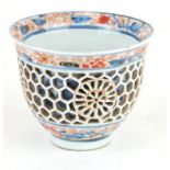 A CHINESE IMARI PORCELAIN RETICULATED DOUBLE WALLED CUP Having pierced honeycomb frame with