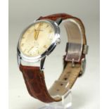 MOVADO, A VINTAGE STAINLESS STEEL WRISTWATCH Secondary dial, on a brown leather faux crocodile