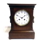 MAPLE & CO., A LATE 19TH CENTURY MAHOGANY CASED LIBRARY TIMEPIECE BRACKET CLOCK Striking on a