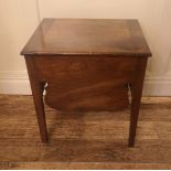 A GEORGIAN MAHOGANY LOW SIDE TABLE The rise and fall top above a shaped apron, raised on square