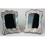 A PAIR OF .925 STERLING SILVER AND ENAMELLED ART NOUVEAU DESIGN ORGANIC PHOTOGRAPH FRAMES . (16cm