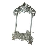 A WMF ART NOUVEAU PERIOD PEWTER STRUT BEVELLED TABLE MIRROR Pierced organic form with semiclad