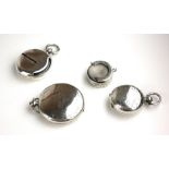 TWO EDWARDIAN SILVER SOVEREIGN CASES Including a circular engraved case hallmarked Chester, 1903 and