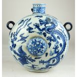 A CHINESE BLUE AND WHITE MOON FLASK Decorated with five toed dragon amongst clouds. (h 27cm)