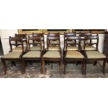 A LONG SET OF TEN REGENCY PERIOD MAHOGANY, BRASS AND MARQUETRY INLAID DINING CHAIRS With scroll