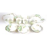 ROSLYN, AN EARLY 20TH CENTURY PORCELAIN TEA SET Decorated in 'Azalea' pattern, comprising four