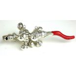 A 19TH CENTURY DESIGN CONTINENTAL SILVER AND CORAL CHILD'S RATTLE/WHISTLE.