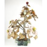 A FINE MID 20TH CENTURY CHINESE HARDSTONE JARDINIÈRE Decorated with trees with six blossoming