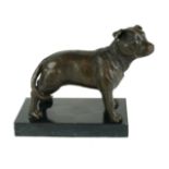 A BRONZE STATUE OF A STAFFORDSHIRE BULL On black marble base. (13cm) Condition: good throughout
