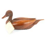 AN AMERICAN CARVED WOODEN DECOY DUCK With red glass eyes. (33cm x 7cm) Condition good throughout