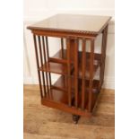 AN EARLY 20TH MAHOGANY REVOLVING BOOKCASE. (53cm x 53cm x 87cm)