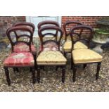 A SET OF SIX VICTORIAN MAHOGANY SPOONBACK DINING CHAIRS.