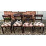 A MATCHED SET OF FOUR REGENCY MAHOGANY BAR BACK CHAIRS.