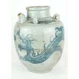 A CHINESE PROVINCIAL MING PERIOD RICE WINE JUG Decorated with a four toe dragon on a pale blue