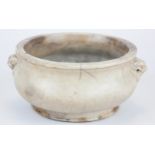 A 17TH CENTURY CHINESE DEHUA BLANC DE CHINE PORCELAIN CENSER BOWL Having lion mask handles and cream