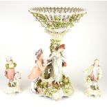 THURINGIAN, SITZENDORF, A LARGE PORCELAIN FIGURATIVE TABLE CENTREPIECE Of highly organic form,