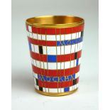 A RUSSIAN SILVER GILT AND ENAMEL SHOT CUP Having red and white geometric enamel decoration, marked