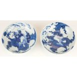 A PAIR OF 19TH CENTURY CHINESE BLUE AND WHITE PORCELAIN BOWLS Having a dragon chasing a flaming