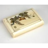 A 19TH CENTURY JAPANESE IVORY AND MOTHER OF PEARL RECTANGULAR BOX INLAID WITH FLOWERS AND BIRDS. (