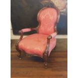 A VICTORIAN MAHOGANY FRAMED OPEN SPOON BACK OPEN ARMCHAIR With central carved cartouche, salmon pink