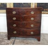 A VICTORIAN MAHOGANY BOW FRONTED CHEST OF TWO SHORT ABOVE THREE LONG DRAWERS With brass plate