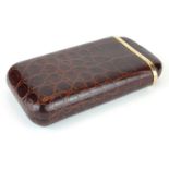 DUNHILL, A VINTAGE 9CT GOLD AND CROCODILE SKIN CIGAR CASE IN TWO SECTIONS With plain 9ct gold