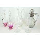 A COLLECTION OF 19TH CENTURY AND LATER CUT GLASS CLARET JUGS A jug with Continental white metal