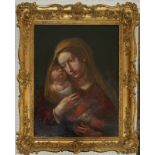 A 17TH CENTURY ITALIAN SCHOOL OIL ON CANVAS, MADONNA AND CHILD In an elaborate gilt frame. (68cm x